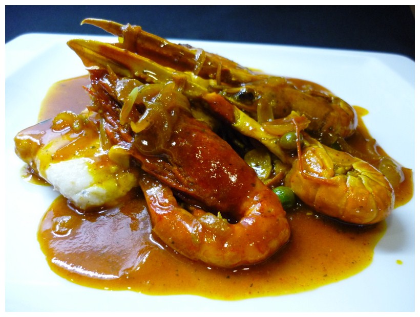Restaurante A Tu Gusto Merluza con salsa de marisco